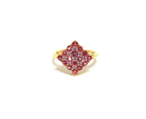 A PINK SPINEL 9 CARAT GOLD CLUSTER RING the square head with nine diamond points, finger size M, 2g gross