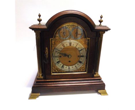 A LARGE 8-DAY EDWARDIAN BRACKET CLOCK  with pull repeat mechanism, the silvered chapter ring with Roman hour markers and Arab