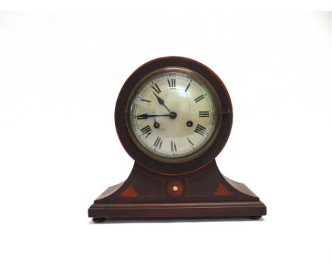 AN EARLY 20TH CENTURY 8-DAY MANTLE CLOCK  the mahogany balloon shaped case with inlaid decoration, the movement stamped 'PHS'