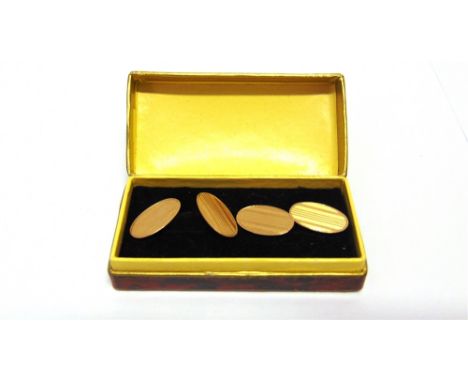 A PAIR OF 9 CARAT GOLD CUFFLINKS  Birmingham 1921, the oval panels with engine turned decoration, 6.2g gross, cased