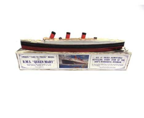 A CHAD VALLEY SECTIONAL 'TAKE TO PIECES' MODEL OF THE R.M.S. QUEEN MARY  complete and boxed (box tray with splits to sides of