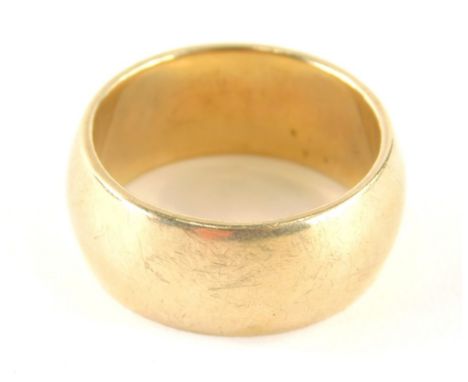 A 9ct gold thick wedding band, ring size T½, 11.4g all in.