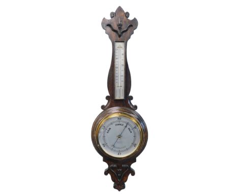 A 20thC oak cased two dial banjo barometer, and thermometer, in shaped case with chrome 18cm Arabic dial.