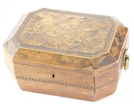 An early 19thC inlaid mahogany tea caddy, of compressed octagonal form with brass handles and plain interior, 12cm high, 24cm