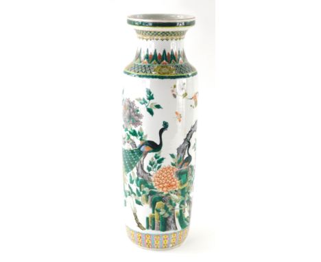 A 20thC Chinese Qing style vase, the compressed trumpet stem raised above a shoulder cylindrical body, profusely decorated wi