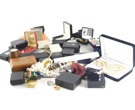 A large quantity of various costume jewellery, Zippo lighter, Borneo pearl brooch, various necklaces, rings, silver marked 92