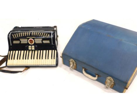A mid 20thC Calui piano accordion, in black with pierced front and 17 black keys, 37cm wide.