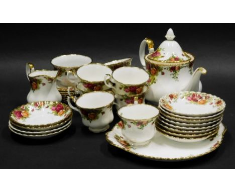 A Royal Albert Old Country Roses part tea service, to include teapot, 20cm high, serving plate, eight cups, seven side plates