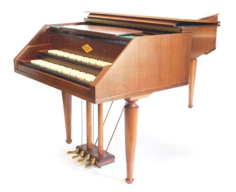 A William de Blaise of London K2 two-manual harpsichord, with two sets of ebony and simulated ivory keys, on turned tapering 