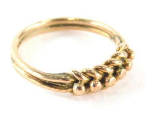 A 9ct gold dress ring, with central six point knot design on two splayed ring band, ring size O, 2.9g all in.