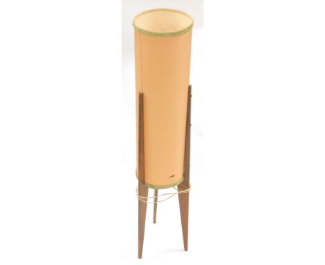 A vintage teak table lamp, the cylindrical orange shade held by three shaped stiles, unsigned, 98cm high.