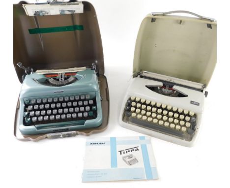 An Adler Tippa metal cased typewriter, with articulated keys, 30cm wide, in outer case and a further typewriter, with Adler T
