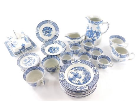 A Yuan blue and white part service, to include cheese dish, 12cm high, jug, plates, side plates, cups, saucers, etc., printed