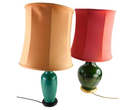 A Chinese style pottery bottle shaped table lamp, in green glaze, 38cm high, and another. WARNING! This lot contains untested