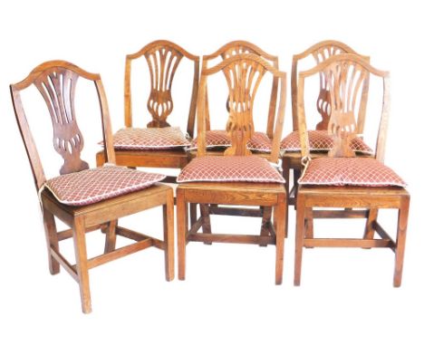 A set of six 19thC elm Chippendale design kitchen chairs, with shaped cresting rails, pierced inverted spats, plain seats, on