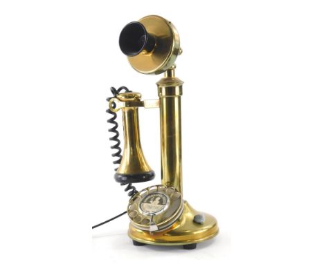 A Conversation Pieces candlestick style telephone, with horn shaped receiver, candlestick stem and front chrome finish dial, 