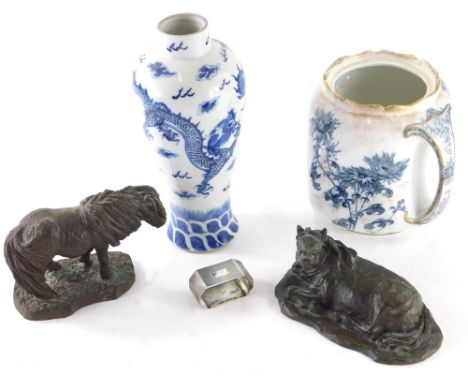 A spelter figure of a recumbent horse, 15cm wide, a figure of a Dartmoor pony, silver napkin ring and a Chinese blue and whit