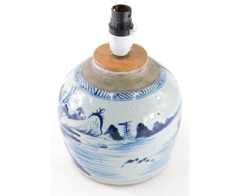 An 18thC Chinese pottery blue and white ginger jar, all over decorated with boats, water and hills, converted to a lamp, 26cm