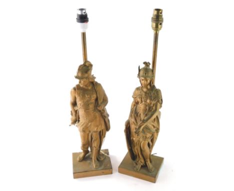 A pair of mid 20thC heavy cast metal lamp figures, of classical soldiers dressed in finery, 53cm high, with electrical fittin