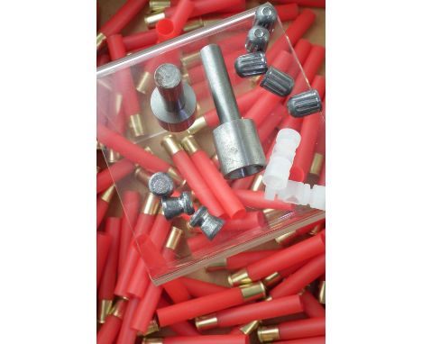 .410 reloading tools and slugs, to include a drill mount roll crimper and case holder as well as 10 rifled slugs with plastic
