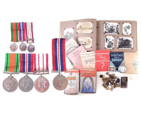 WWII and later medal group and related items for E.H Woolley, including Naval General Service Medal with South East Asia 1945