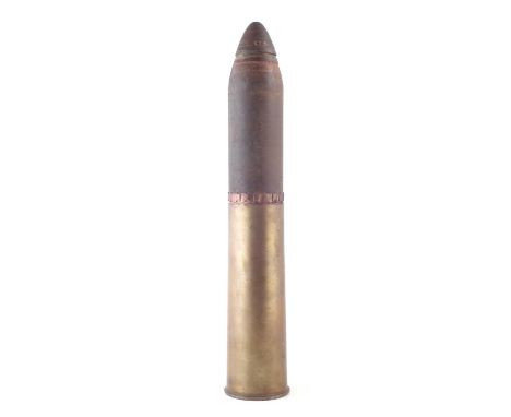 18 pounder artillery shell, the foot dated 1916 and stamped with broad arrow mark, the head fitted with USA made shrapnel fus