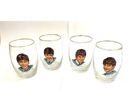 A set of 4 vintage glass tumblers depicting The Fab Four - John, Paul, George and Ringo. Beatles interest.