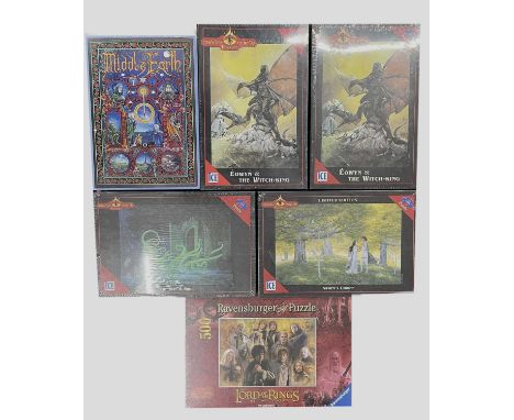 A mixed lot of offical Lord of the Rings jigsaw puzzles to include: - The Way is Shut by ICE - Eowyn and The Witch King x 2 b