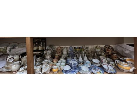 A Noritake part coffee set decorated with a desert scene together with a large collection of Noritake part tea and coffee set