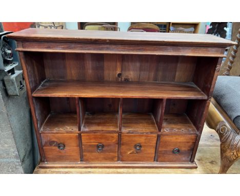 A table top cabinet with a moulded cornice above a shelf and four compartments and four drawers, 70cm wide together with anot