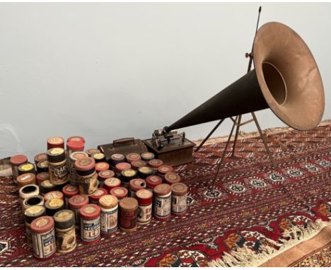 An oak cased Columbia Gramophone, with horn, tripod stand and numerous Edison Bell and Clarion Records cylinders