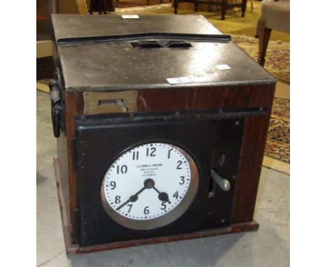 A Gledhill-Brook portable table-top oak case time recorders clock with metal top and carrying handles, 36 x 37cm, 38cm high.