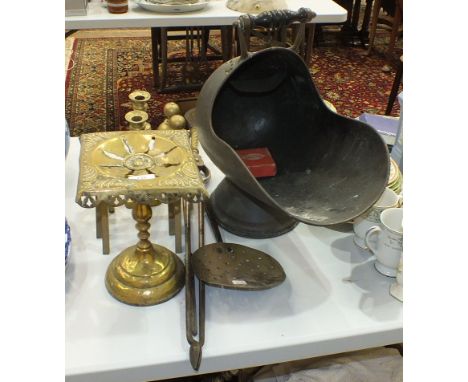 A copper coal helmet, a brass trivet, other brass and copper ware and a small quantity of linen.