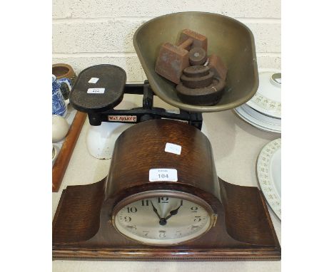 An oak-cased chiming mantel clock, 24cm high and a set of Avery potato scales to weigh 14lb, (2).