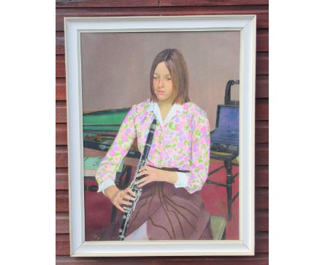 EDWIN GREENMAN (1909-2003), PORTRAIT OF KATIE BISS SEATED WITH A CLARINET, ¾ LENGTH, OIL ON CANVAS, REVERSE LABEL (100cm x 75