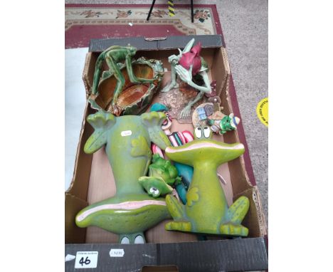 A collection of decorative ceramic and resin frog theme items: 