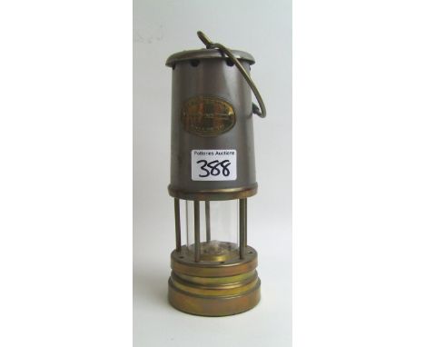 A brass and steel miners lamp. 