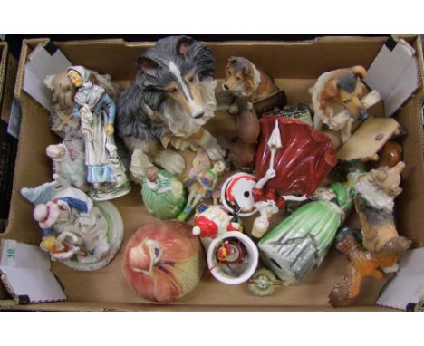A collection of ceramic &amp; resin figures to include: dogs, lady figures, orniments etc 
