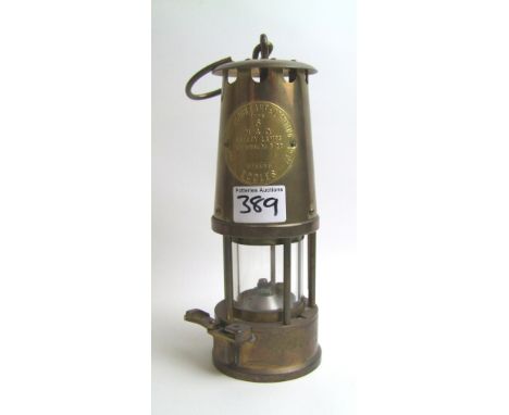 A brass Eccles miners lamp. 
