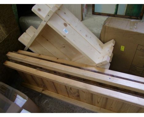 A wooden planter: together with raised bed sides. 