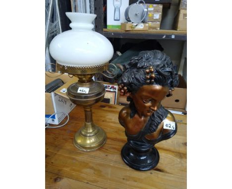 Bronzed plaster bust: together with 20th Century reproduction oil lamp 