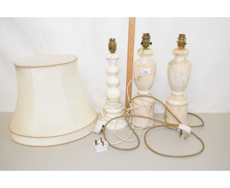 Two onyx table lamps and a further ceramic example with shade