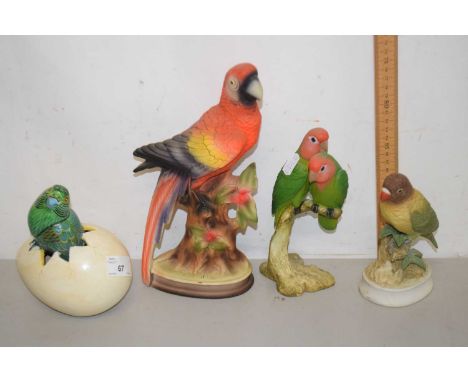 Group of ceramic bird figures, love birds on a branch, parrot etc