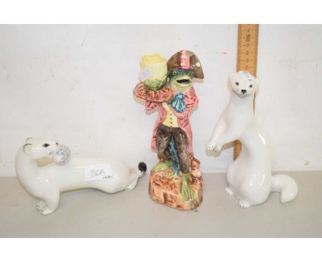 Two ceramic models of seals and a further model of a frog with Majolica glazes