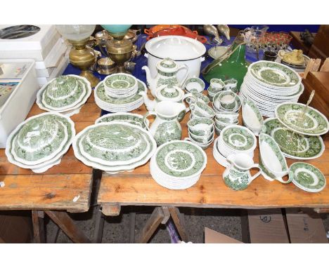 An extensive group of tea wares made by Adams decorated with English scenes comprising dinner plates, side plates, cake plate