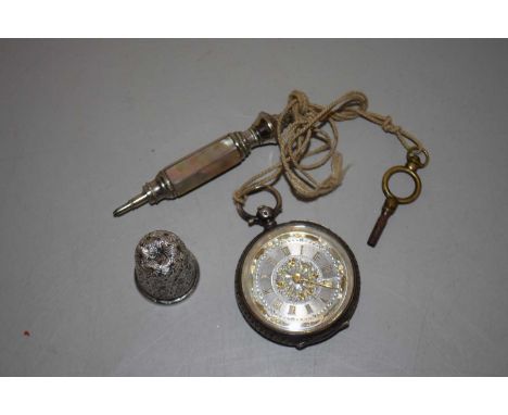Envelope containing a silver thimble and a silver pocket watch with gilt metal dial