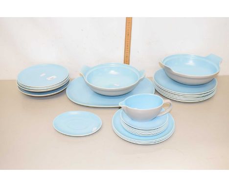 Quantity of Poole Pottery dinner wares including two tureens, oval serving dish, dinner plates, gravy boat etc