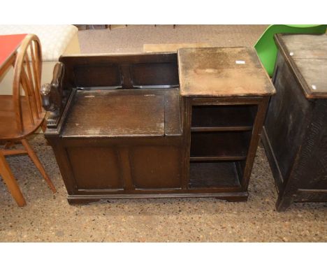 A stained pine telephone table/monks bench