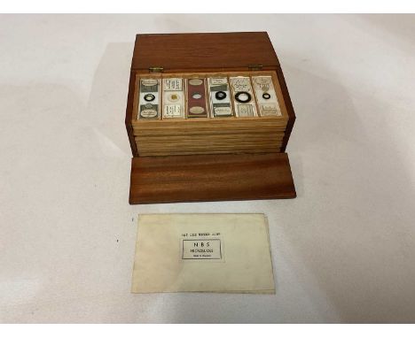 MICROSCOPE SLIDES; an Edwardian mahogany case with twelve drawers of prepared miscroscope slides including a set of twelve by