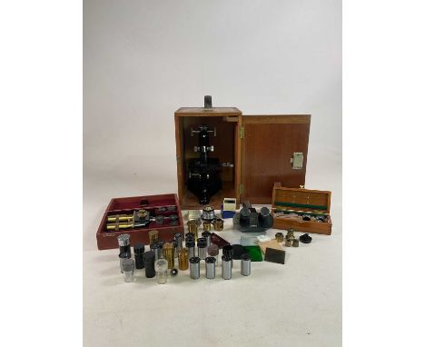 BECK OF LONDON; a cased binocular microscope with upper attachment signed 'Watson, Barnett', an Ernst Leitz leather cased bin